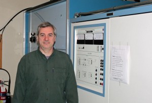 Paul Thurst standing in front of a Nautel XL60 medium wave transmitter