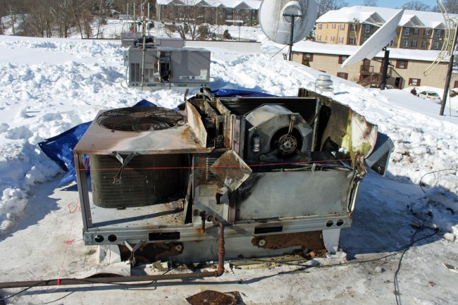 Carrier HVAC unit damaged by fire