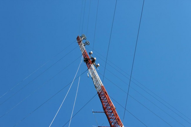 Cellular panel antenna array being removed from a tower