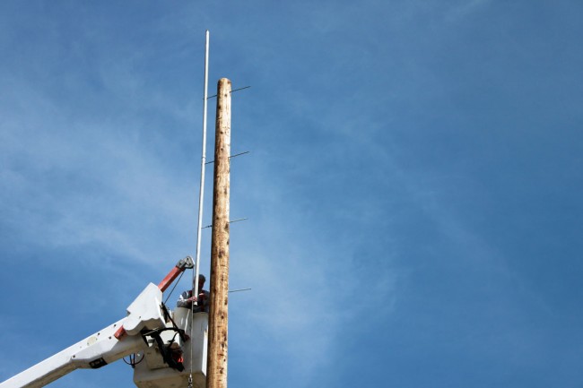 Mounting pole to tower